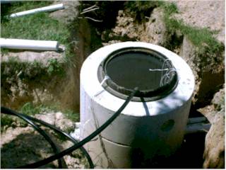 Water line in manhole