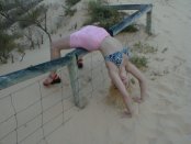 Doing a strange stretching exercise