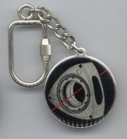 Large black round, showing rotor.  Clear backside