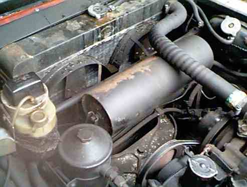 Additional servo tank on FF73, a car maintained by Jensen parts and service.