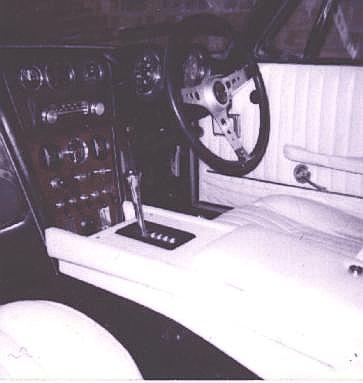 Plush, functional wallnut & leather interior of the MK1 FF.