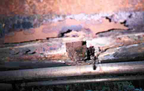 Rust near front seat cross member