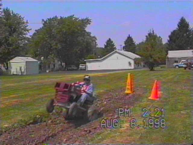 TRISH PULLING A WHEELIE ON THE POWER SLAVE