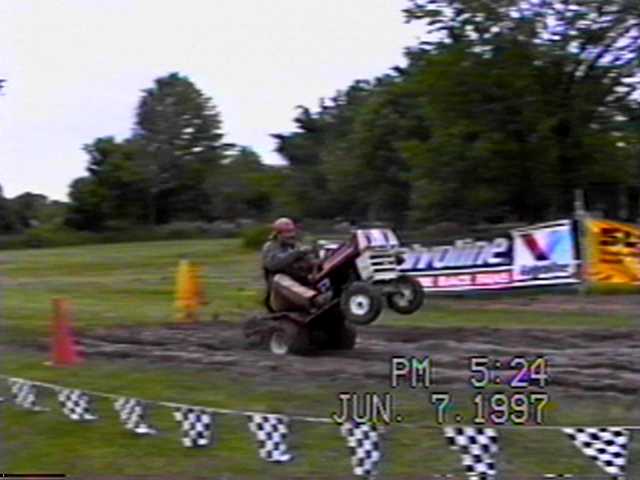 BILL BURWELL DOING A WHEELIE ON THE MUD SHARK