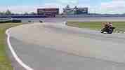 Dave sweeps through the long turn 1a