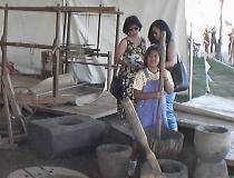the womenfolk demonstrating knowledge of native kitchen customs