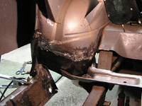 GTO wheel well patches almost fully welded up.