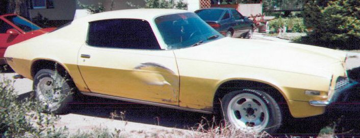 Side of 1971 Chevy Camaro with damage