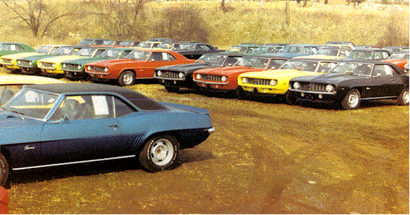 69 69 67 chevrolet camaros in a yard