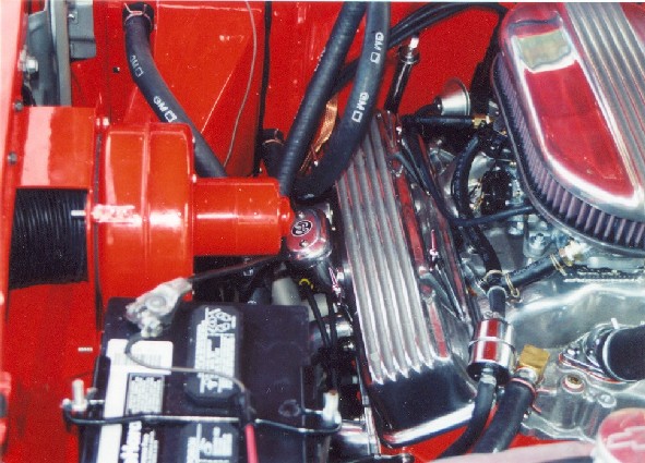 Passenger side view of mid-engine area