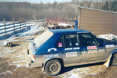 Mayhem Racing Dodge Omni and a flock of chickens.
