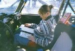 Brenda Corneliusen pours over the route book.