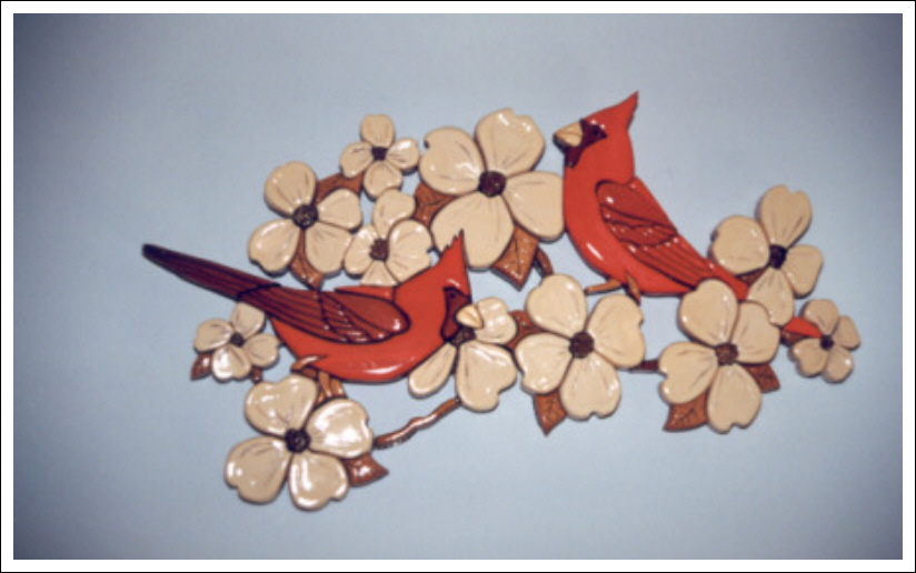 TWO CARDINALS ON DOGWOOD
