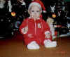 Paul under xmas tree Dec 98.jpg (11817 bytes)
