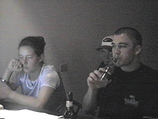 Guys and girl in front of Computer