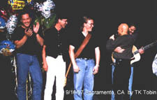 Kevin shares hugs with the band.