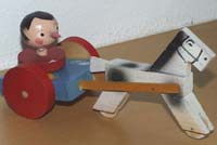 Pinocchio on a carriage with horse