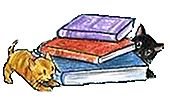 cats playing on the text books