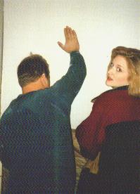 Chip and Mesha holding sheetrock up