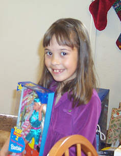 Kylie with her TOY Story 2 Barbie