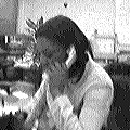 Jenni answering the helpline phone (8498 bytes)