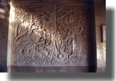 View of stone wall carving off lobby