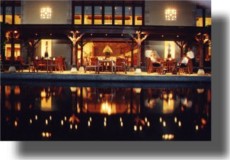 Night view of exterior restaurant/trellis seating