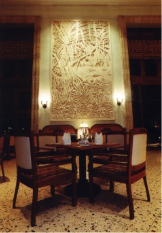 View of 5.5 metre high stone wall carving in Main Restaurant
