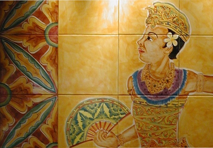 Enlarged detail of the hand painted ceramic tile mural of a balinese male dancer