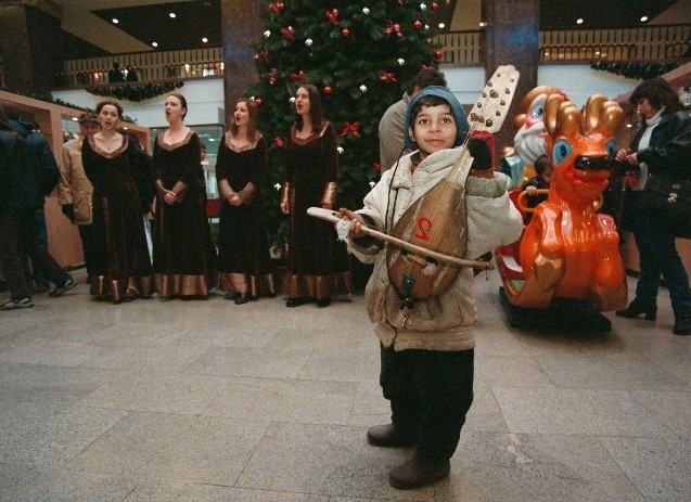 Christmas Carol singers with 'accompaniment' in Tzum December 2000.