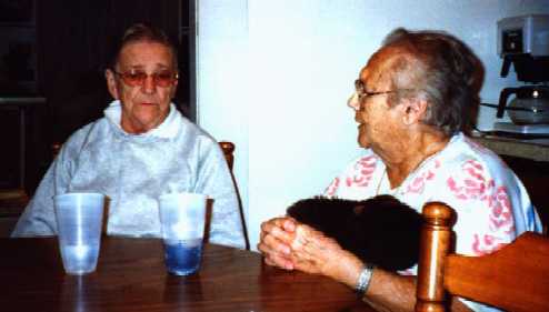Grandmas Simmons and Littrell discuss whatever strange radioactive liquid Mom served them. (Photo Copyright 1999 by Carolyn Smith)
