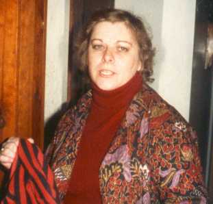 Mom (circa 1986 or so) - this is the usual look you get when you point a camera at her