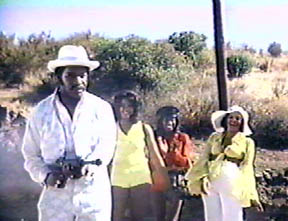 Dolemite's bitches laugh and applaud as he kills a honky.