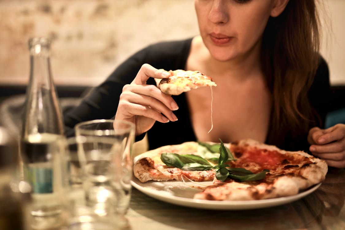 girl with pizza