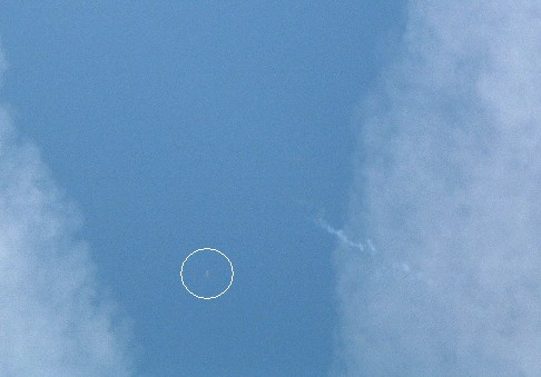 This image shows part of Ascent 3's vapour trail and the distant parachute, opening at the start of vehicle recovery phase [Credit: AAI]