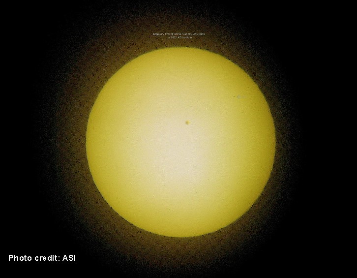 Mercury is the black speck on the upper right hand side of the solar disk indicated with arrow