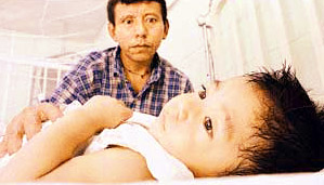 Father with daughter in hospital
