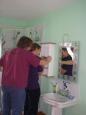 John and Ricey with cabinet