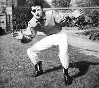 Johnny poses in his front garden