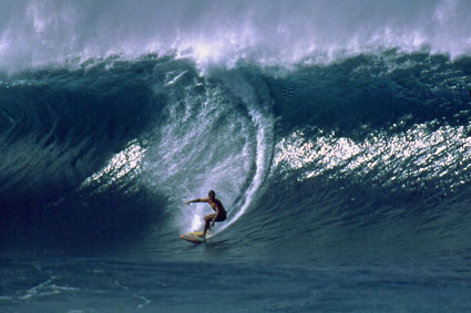 Surfing down a big wave