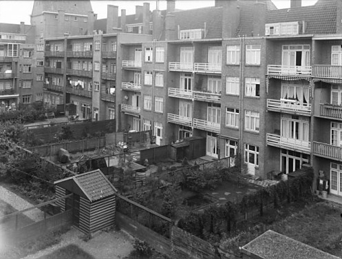 [view of the gardens behind/within the van Maarsen's apartment building]