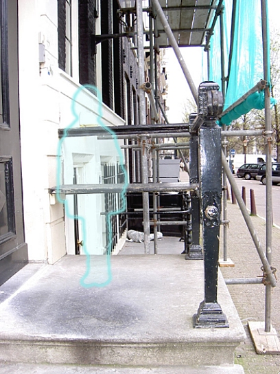 [entrance of 1933-1939 business building, with 1935 ghost]