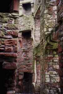 Fireplaces suspended in the floorless Nithsdale Lodging interior.