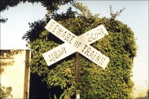Crossing bucks all say the same thing in any language. December 1999.