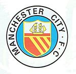 http://upload.wikimedia.org/wikipedia/commons/thumb/0/0b/Man_city_badge_1960.jpg/150px-Man_city_badge_1960.jpg