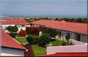 Courtyard View of Chalets (Sea in the Background)