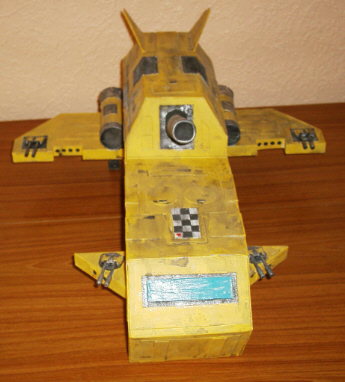 Front view. The wind screen is gloss arnished for a shine. Notice the holes for the rockets on the wings