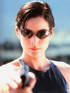 Carrie-Ann Moss as Trinity gets in as Hikari's alternate body