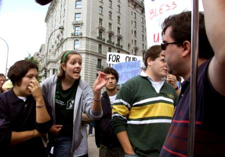 Protestors in Washington arguing with pro-war person. This is what it's going to take to win people to an anti-war position.