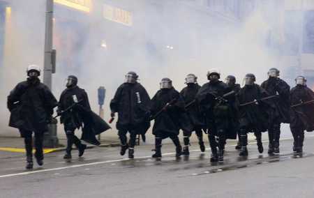 Now that's what I call a Trenchcoat Mafia; 
a Mafia protecting the interests of organized crime 
- capitalism!